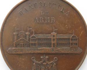 BNR pune in circulatie o moneda de argint dedicata Manufacturii de arme