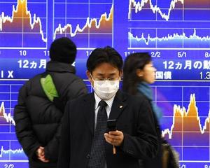 OECD si-a redus la jumatate estimarile privind cresterea economica a Japoniei
