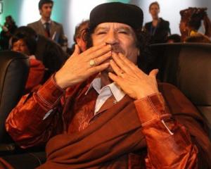 Gadhafi si manifestarile sale ciudate de afectiune