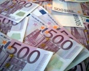 Analisti: Moneda euro va orbita in jurul valorii de 1,24 dolari