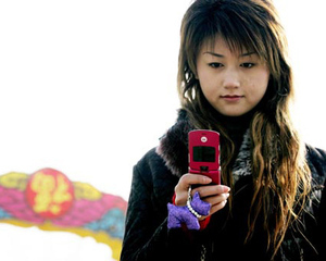 Peste 900 de milioane de chinezi folosesc telefonia mobila