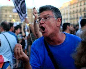 Zeci de mii de "indignati" protesteaza in Spania si Israel