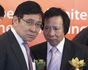 Doi frati din Hong Kong au pierdut 2,3 miliarde de dolari, dupa ce au fost arestati de autoritati