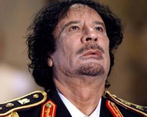Chirurgul lui Gadhafi vorbeste: Muammar a mancat hamburgeri in timpul operatiei estetice