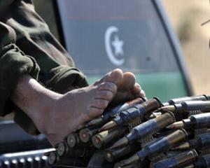 Rebelii libieni recastiga un oras cheie, dupa bombardament