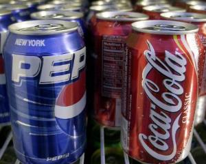 Caramelul din Cola si Pepsi este cancerigen. Companiile spun ca nu este asa, dar isi modifica reteta