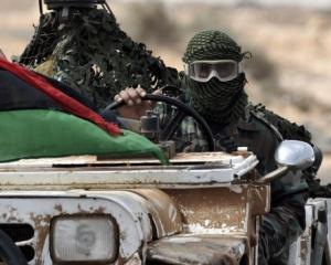 Rebelii libieni pusi pe fuga de Gadhafi