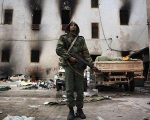 LIBIA: Gadhafi a angajat mercenari din Romania