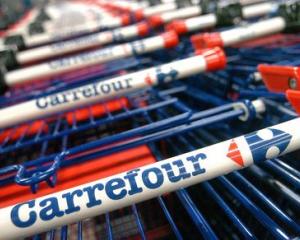 ING: Carrefour ar putea pleca din noua tari, printre care si Romania