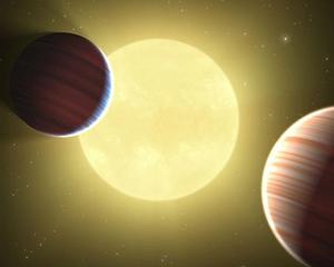 PREMIERA: Au fost descoperite doua planete care impart aceeasi orbita