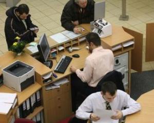 Opt banci din Grecia, dintre care sase activeaza si in Romania, au fost puse sub supraveghere de Moody's 