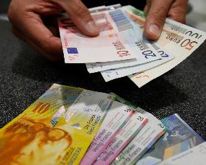 Elvetia cumpara euro pentru a proteja moneda nationala