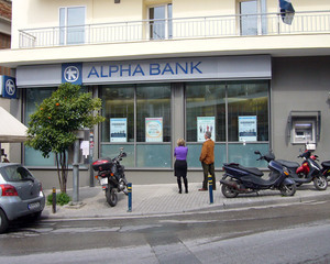 Alpha Bank a inregistrat pierderi in Romania