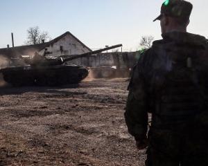 Oficial american: Unele companii militare germane i-au instruit pe soldatii rusi detasati in Crimeea