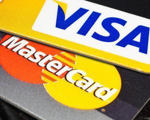Daca Visa si MasterCard vor sa faca afaceri in Rusia, trebuie sa achite cateva sute de milioane de dolari