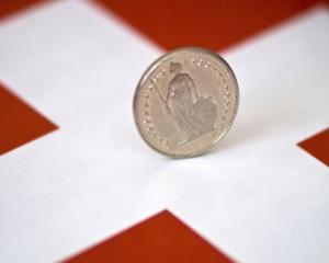 Cursul francului elvetian poate redeveni franc