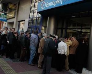Bancile grecesti se redeschid, restrictiile raman