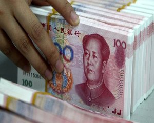 Moody's a revizuit in scadere ratingul datoriei de stat a Chinei, pentru prima data in trei decenii