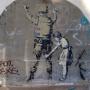 Dezvaluirea identitatii lui Banksy: un mister care ar putea fi sfarsit prin hotararea unui tribunal