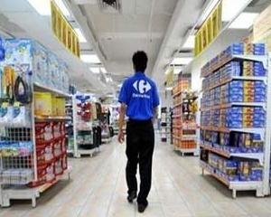 Carrefour a fost amendata cu 3,66 milioane de euro, pentru ca nu le-a platit unor angajati salariul minim pe economie