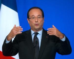 Hollande vrea ca angajatorii sa plateasca impozite de 75%