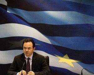 Sondaj printre analisti: Grecia va fi incapabila sa-si plateasca datoriile. Zona Euro va supravietui