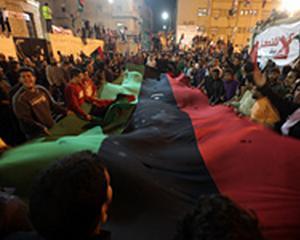 Libia anunta incetarea focului. Pretul la petrol scade, actiunile cresc