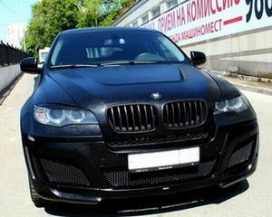 Tuning auto extrem: BMW imbracat in piele de vaca