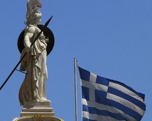 Grecia primeste banii de la FMI, dar nu scapa de probleme